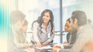 Manager coaching employees and team to perform on their own